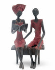 Bronze couple assis 20 cm rouge n°1 Bronzes d'Afrique