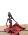 Bronze assis au sol 25 cm rouge n°5 Bronzes d'Afrique