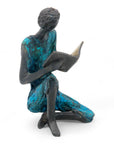 Bronze assis à poser 25 cm bleu n°3