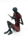 Bronze assis à poser 25 cm rouge n°2 Bronzes d'Afrique
