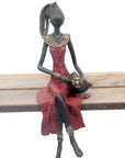Bronze assis 35 cm rouge n°2 Bronzes d'Afrique