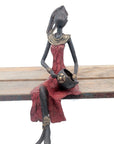 Bronze assis 35 cm rouge n°2 Bronzes d'Afrique