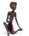 Bronze assis à poser 55 cm rouge n°1 Bronzes d'Afrique