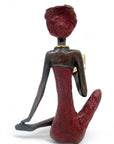 Bronze assis à poser 55 cm rouge n°1 Bronzes d'Afrique
