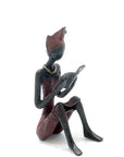 Bronze assis à poser 25 cm rouge n°7 Bronzes d'Afrique